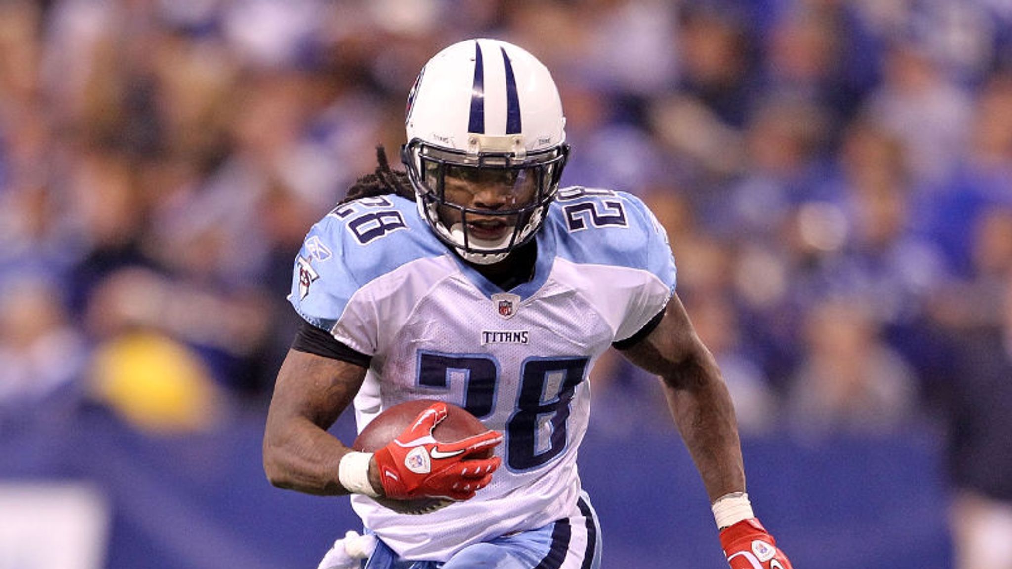 Tennessee Titans running-back Chris Johnson (28) carries the ball