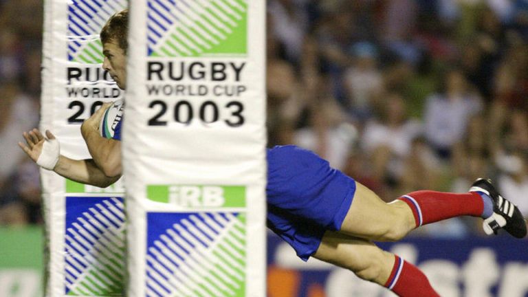 French winger Aurelien Rougerie dives between the posts at the Dairy Farmers Stadium in Townsville