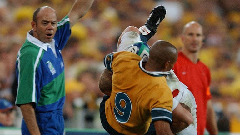 Australian scrum-half Gregan is thrown into touch by England's Ben Kay