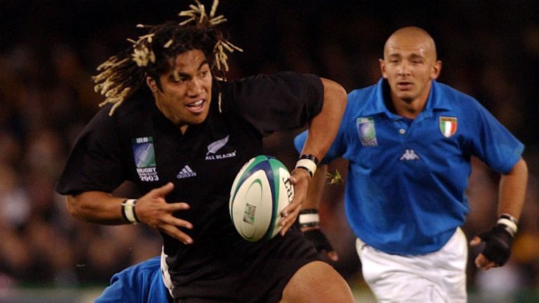 New Zealand's Ma'a Nonu evades Italian defenders on the way to a convincing 70-7 victory in the All Blacks' opening match
