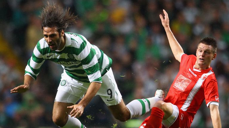 Georgios Samaras of Celtic is tackled by Michael Dingsdag of FC Sion