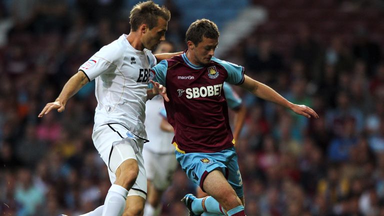 George McCartney: Intends to remain with West Ham and allow his Sunderland contract to run down