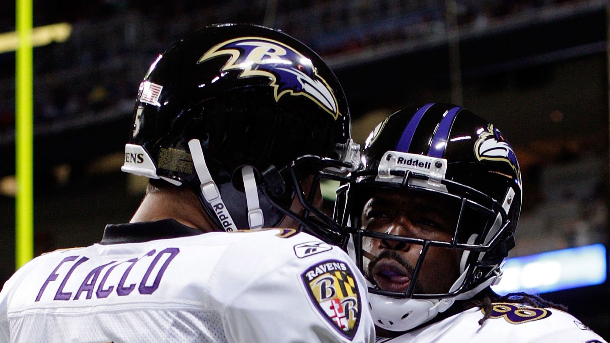 Baltimore Ravens wide receiver Torrey Smith pulls down a pass near the end  zone as Pittsburgh Steelers cornerback William Gay defends. Smith is pushed  out of bounds but Gay is called for