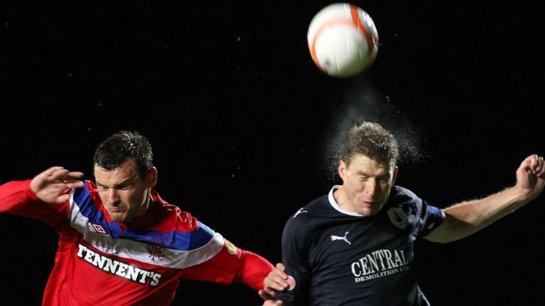 Rangerss Lee McCulloch left challenges Falkirks Darren Dods during the Scottish Communities League Cup, Third Round match at Falkirk Stadium, Falkirk.