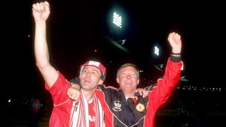 Ferguson celebrates winning his first major honour with Manchester United after beating Crystal Palace in extra-time of the 1990 FA Cup final replay.