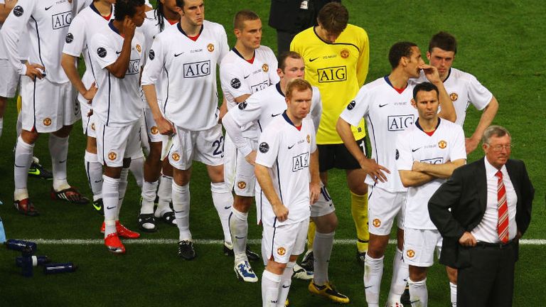 Disappointment for Sir Alex as he leads his team to receive their runners-up medals after being defeated by Barcelona in the 2009 Champions League final.
