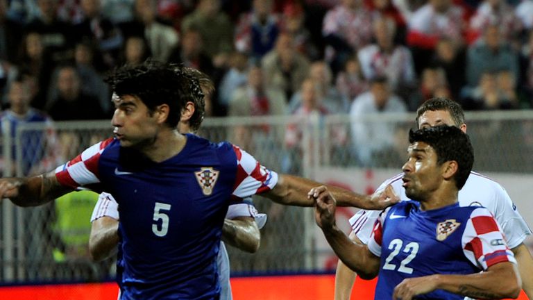 Vedran Corluka: Croatia international says he begged Tottenham boss Harry Redknapp for a move