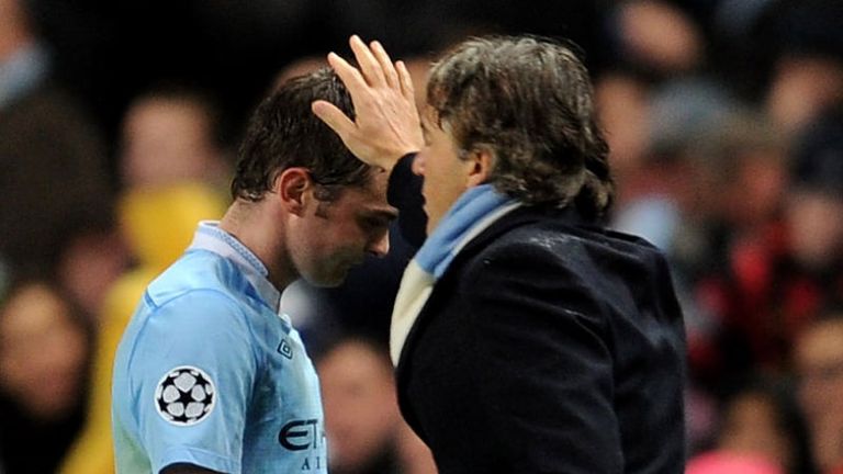 Adam Johnson: The Manchester City winger is continually asked to do more by Roberto Mancini