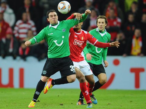 Image of Manuel Schmiedebach: Battles with Standard Liege's William Vainqueur in a result which favoured both sides