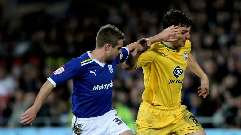 Stephen McPhail and Chris Martin tussle for the ball during the Carling Cup semi-final second leg