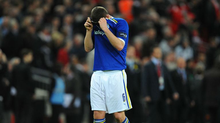 Anthony Gerrard stands dejected after missing the deciding penalty at Wembley.