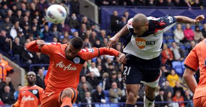 In the early kick-off at the Reebok Stadium, it's the home side who draw first blood when Darren Pratley heads home a cross from Petrov.