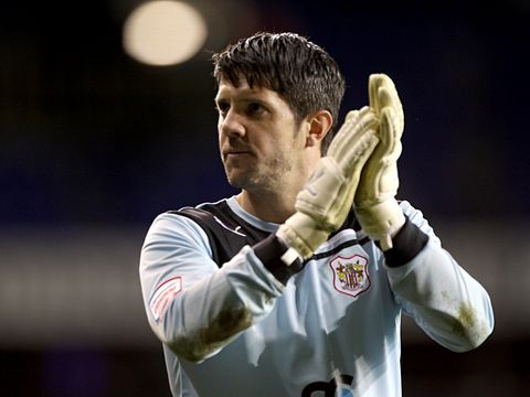 Image of Chris Day: Commits to one more year