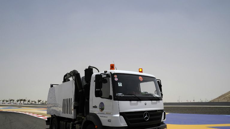 The organisers try to keep the track clear of sand
