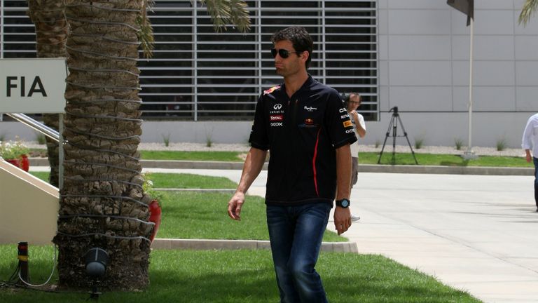Mark Webber arrives in the paddock