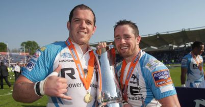 Shane Williams celebrates Ospreys' title success with Paul James