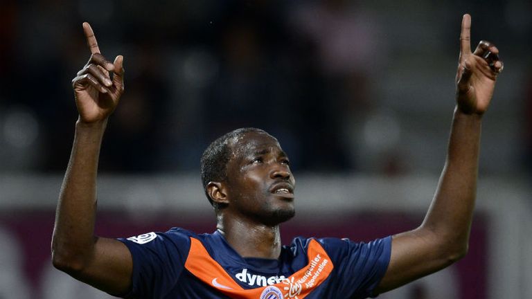 John Utaka celebrates scoring Montpelliers equaliser against Auxerre