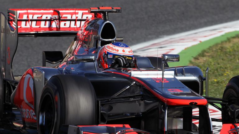 Jenson Button tries out the new nose on the McLaren...