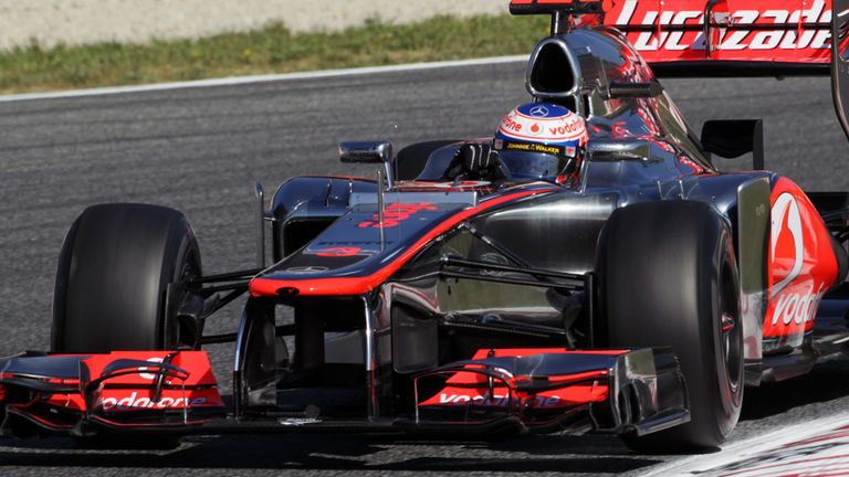 Jenson Button tries out the new nose on the McLaren...