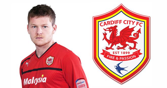 Cardiff's home shirts will be red for next season, with the club's badge also changed