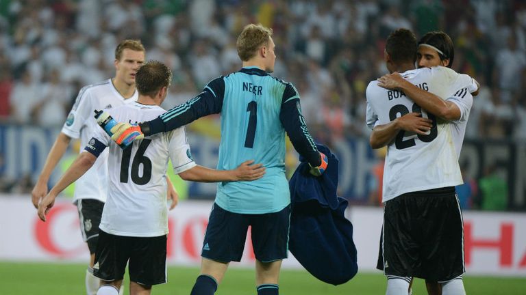 The referee blows for full time and Germany have withstood Portugal's late onslaught to claim three points and top spot in group B.
