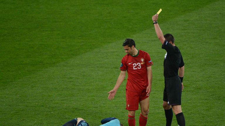 Manuel Neuer rushes out of to meet a short back pass and is caught late by Helder Postiga. Neuer's reaction is theatrical but Postiga deserves his booking.