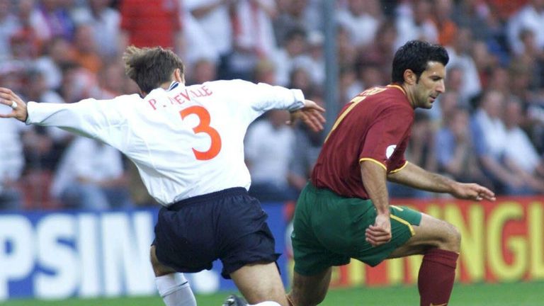 stupid-skunk802: luis figo wearing half real madrid and half barcelona  jersey taking action with fullbody view