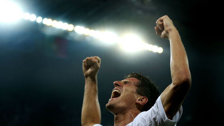 Mario Gomez scores Germany's only goal in a 1-0 win over Portugal after a tightly fought match in Lviv.