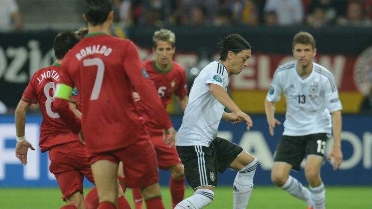 Mesut Ozil is the focus of Germany's play, and the Real Madrid man bursts forwards, almost creating a 1 on 1 situation.