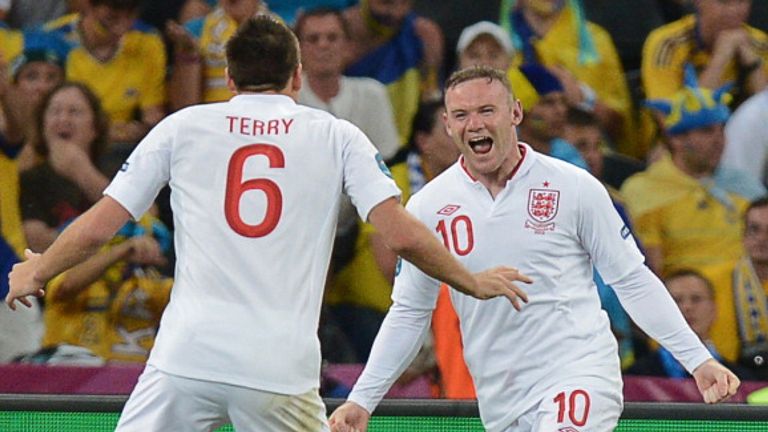 Wayne Rooney celebrates with john Terry after scoring Englands opener