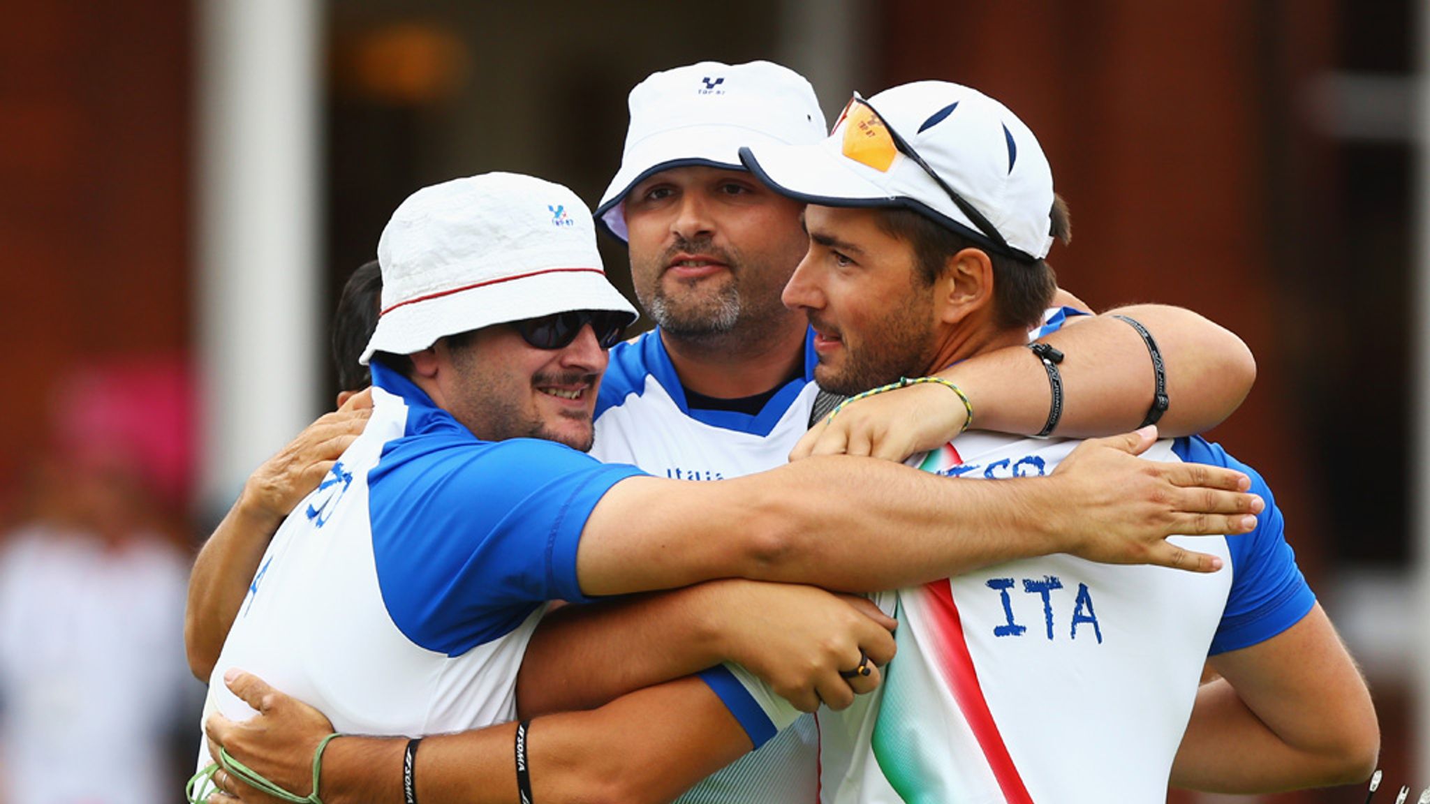 Italian archers holding gold medals Turning Points: How Cuneo’s Archers Dominated