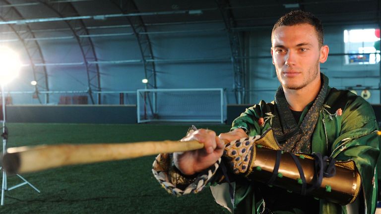Vermaelen was kitted out in a traditional Chinese warrior's attire at London Colney to promote the club's Far East tour.