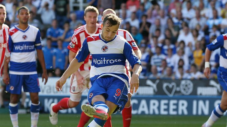 Adam Le Fondre scores from the penalty spot to equalise for Reading
