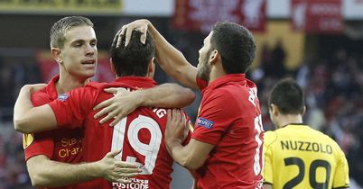Liverpool players celebrate after Stewart Downing's cross had led to the opening goal