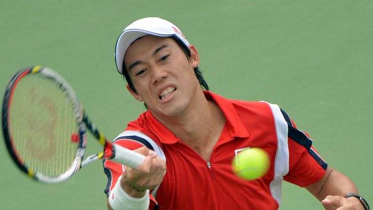 Kei Nishikori in action as he beats Wu Di in the first round of the Shanghai Masters