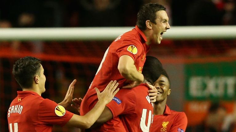 Stewart Downing of Liverpool celebrates scoring the opening goal against Anzhi Makhachkala