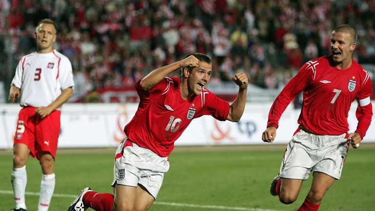 KATOWICE, POLAND - SEPTEMBER 8: Michael Owen of England celebrates their second goal during the 2006 World Cup Quailfier Group 6 match between Poland and England at the Slaski Stadium on September 8, 2004 in Katowice, Poland