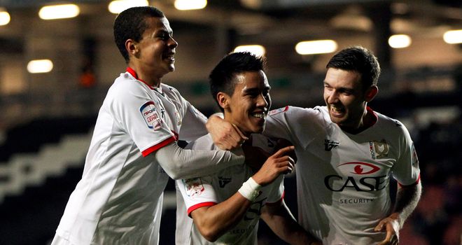 Chicksen: Celebrates goal for Dons