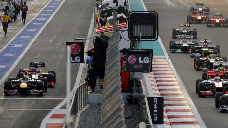 A story of two starts: Vettel waits in the pitlane as the race begins