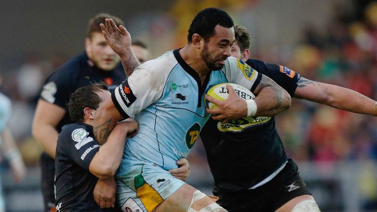 Samu Manoa makes some hard yards for Northampton