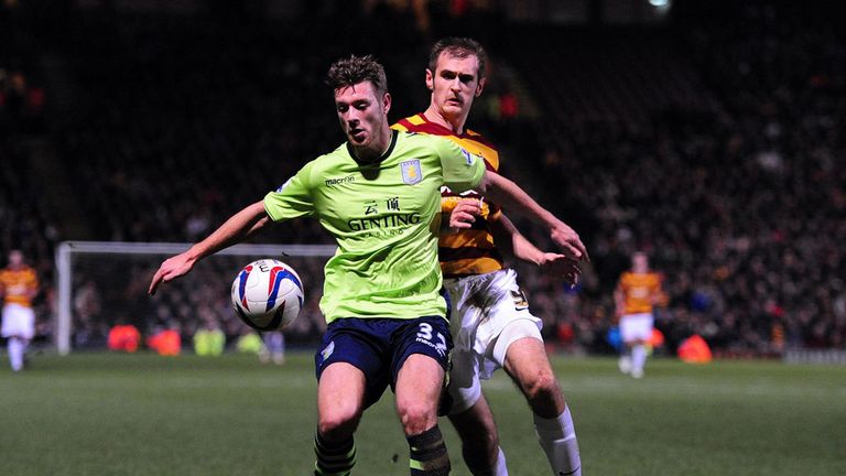Nathan Baker and James Hanson battled for the ball