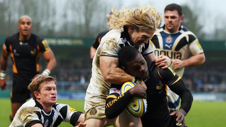 Christian Wade: Is tackled by Tom Biggs of Bath