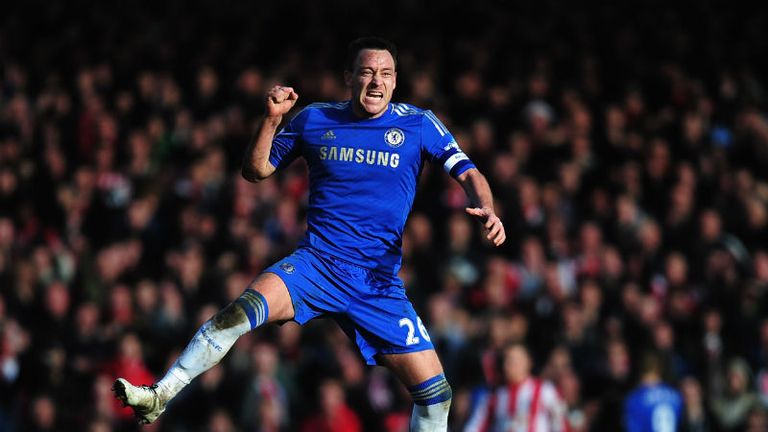 John Terry celebrates as team mate Fernando Torres equalises to force a replay in their FA Cup fourth-round clash with Brentford