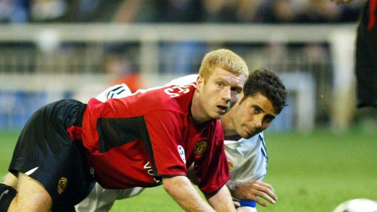 Paul Scholes and Fernando Hierro compete for the ball as Real won their 3-1 in the first leg