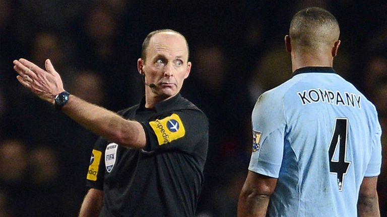 Vincent Kompany sent on his way by referee Mike Dean