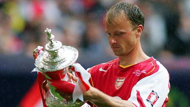 Image of Dennis Bergkamp with the FA Cup in 2005 - the last time Arsenal won a trophy