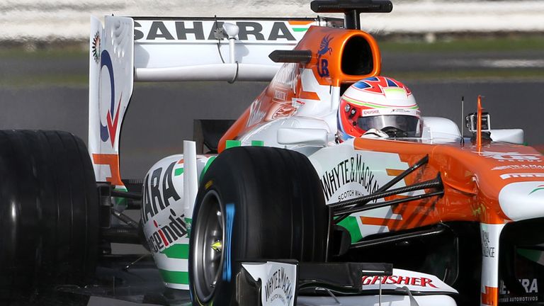 Paul di Resta takes the new Force India car for its shakedown at Silverstone.