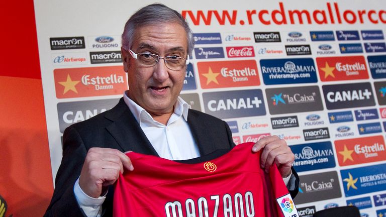 Mallorcas new coach Gregorio Manzano holds his new jersey during his official presentation at Iberostar stadium in Palma de Mallorca on February 5, 2013. Real Mallorca said today they have reached an agreement for Gregorio Manzano to take over as coach, a day after they fired Joaquin Caparros