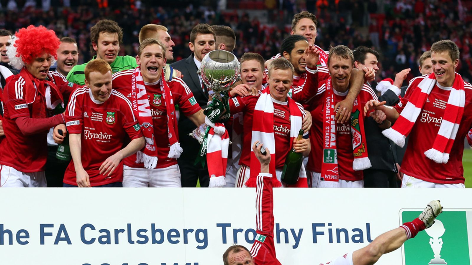 Wrexham lift the FA Trophy after beating Grimsby 41 on penalties
