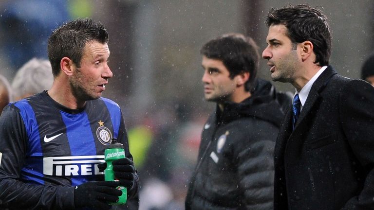 Andrea Stramaccioni, right, has played down his 'discussion' with Antonio Cassano, left